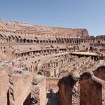 Wide view across the interior of the Colosseum