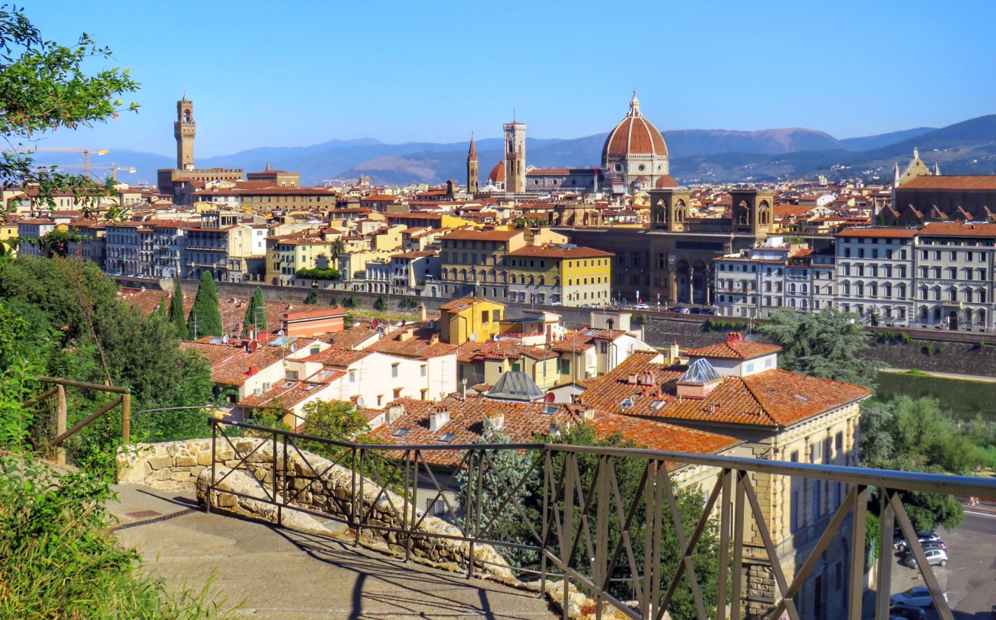 Florence's rooftops with the cathedral dome and the tower of Palazzo Vecchio