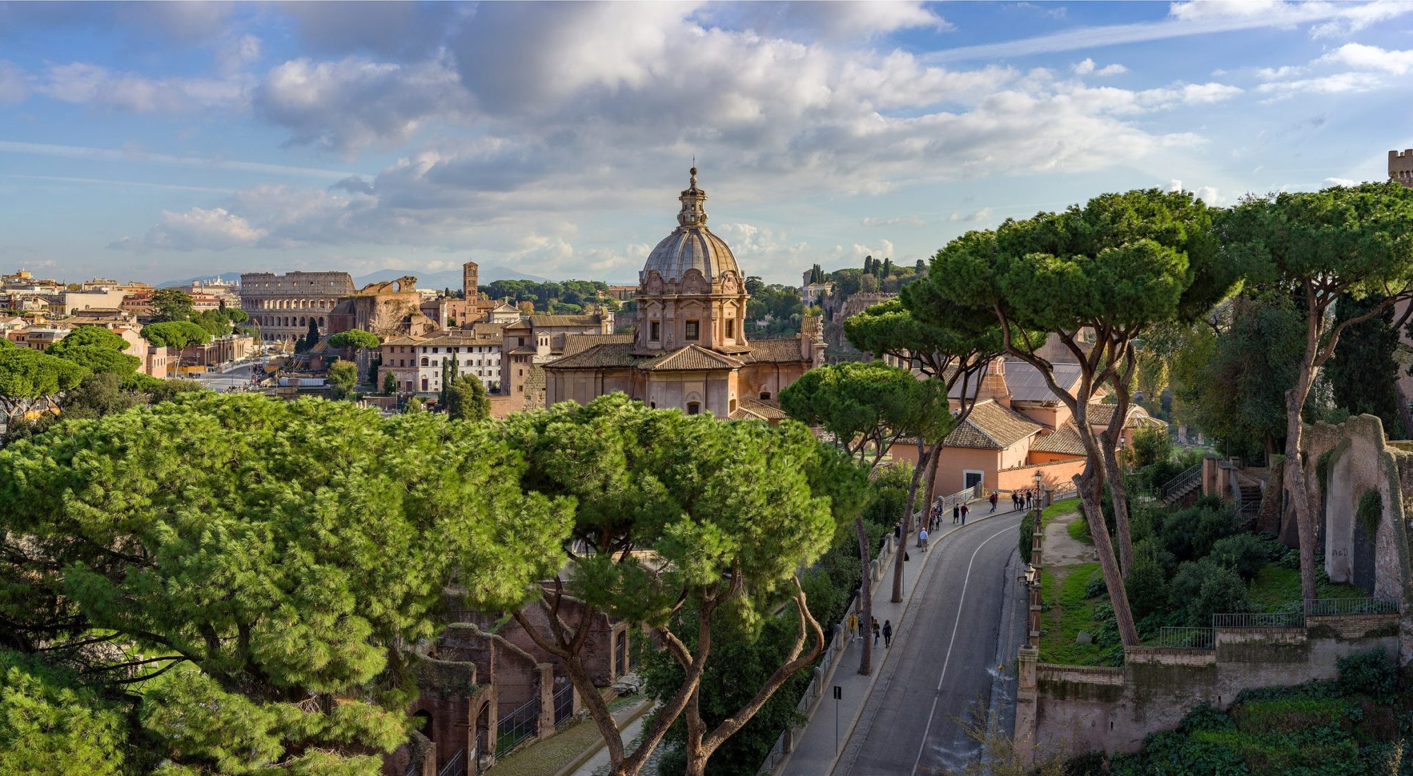 The Roman Forum seen from above, with umbrella pines and a church dome
